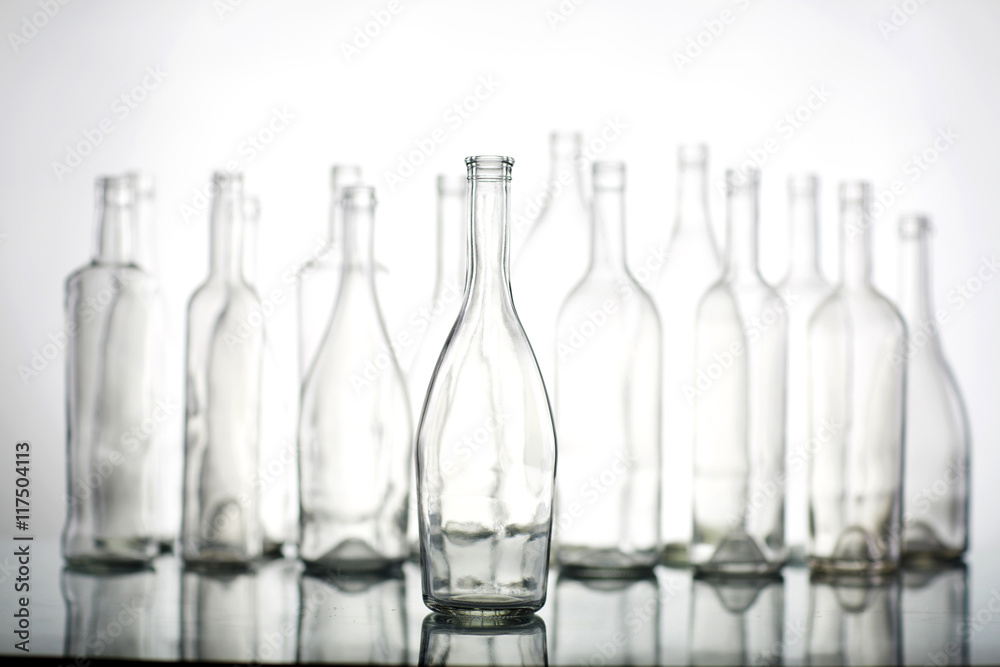 Empty bottles isolated over the white background