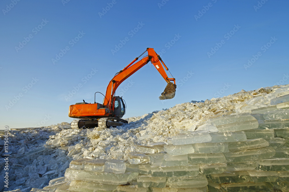 Many ice together, ditching machine is working Many ice together, ditching machine is working