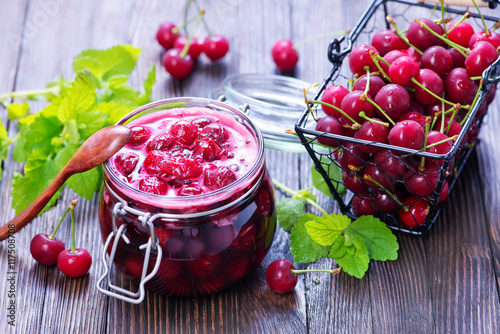 cherry jam and berries photo