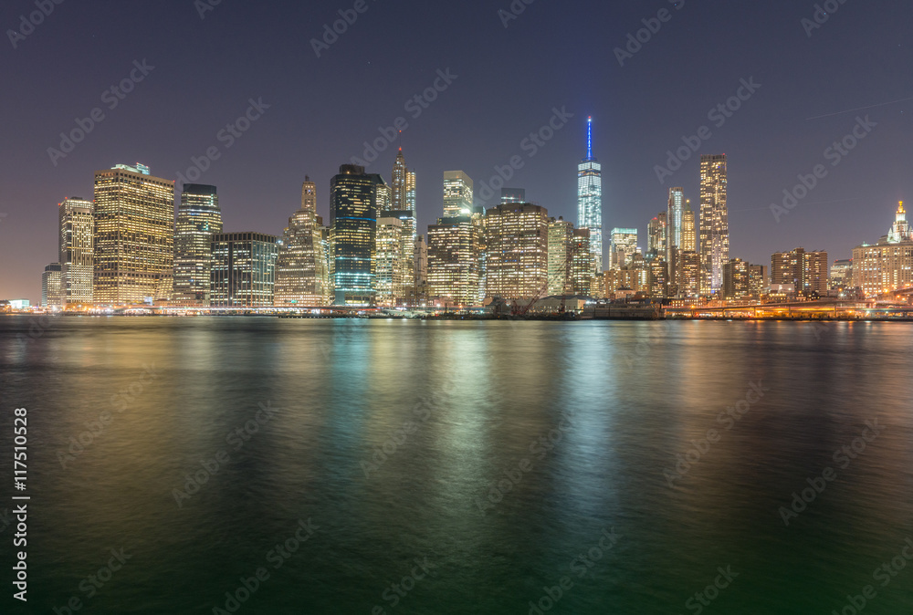 Downtown Manhattan and water reflections at sunset, new York Cit