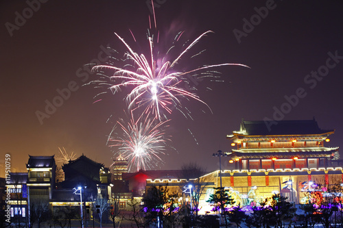Canvas Print Fireworks up ancient buildings at night, in China