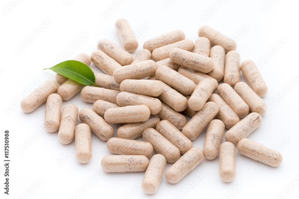 Ginkgo biloba capsule on the white background. Ginkgo biloba capsule on the white background.