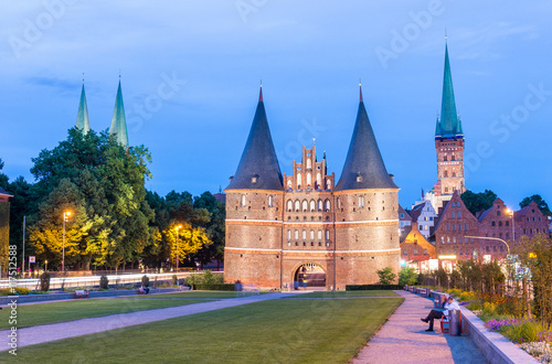 Medieval Holstentor gate at night, Lubeck, Germany