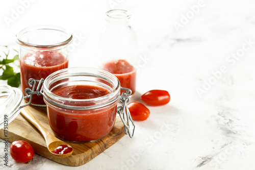 Homemade ketchup with tomatoes, chili and peaches
