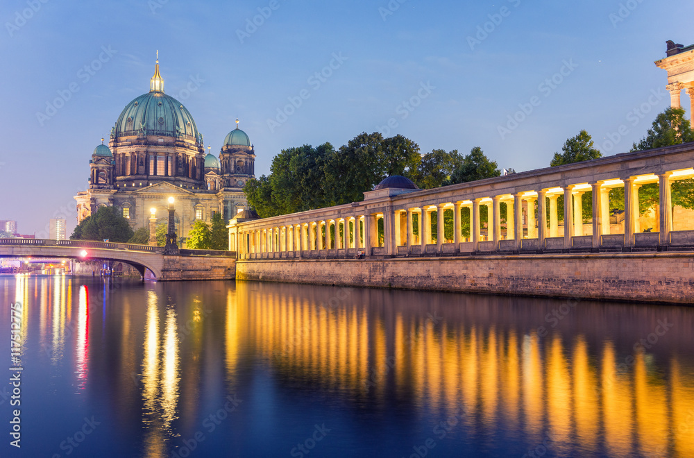 Berlin Cathedral at night with Spree river reflections of column