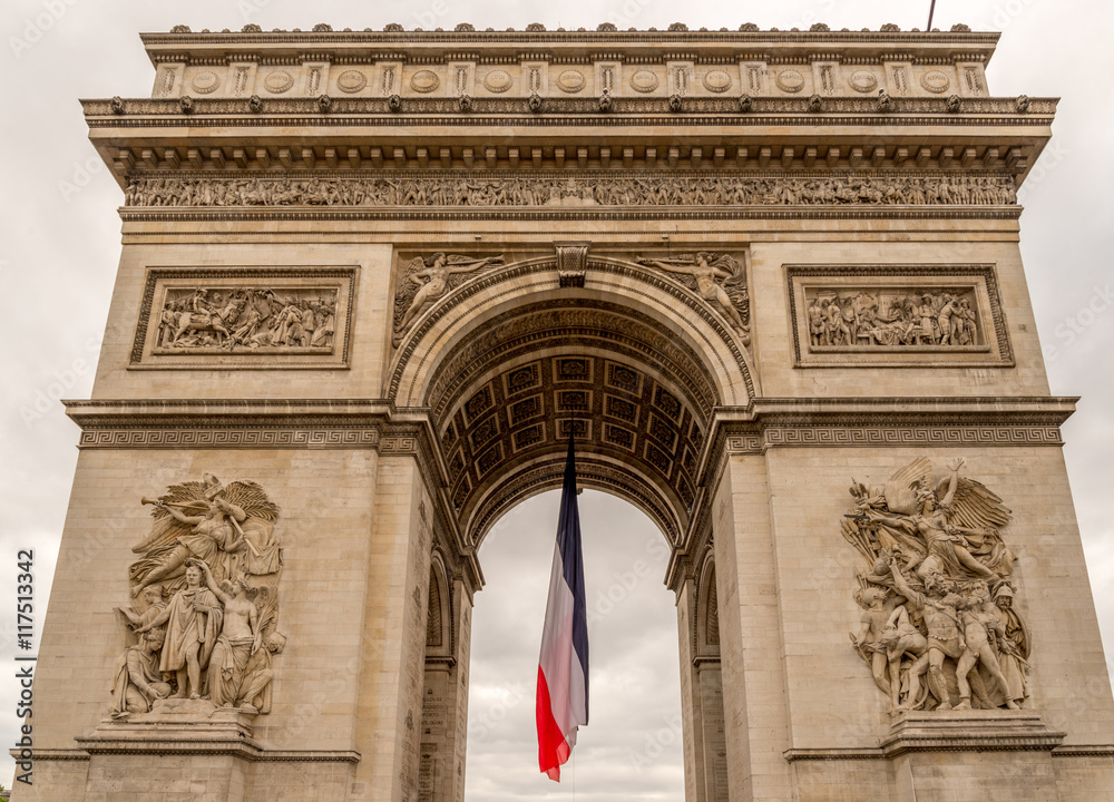 Obraz premium Arc de Triomphe with french flag