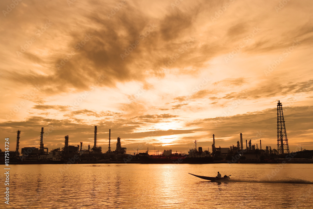 Naklejka premium Oil refinery industry at sunset time, Thailand
