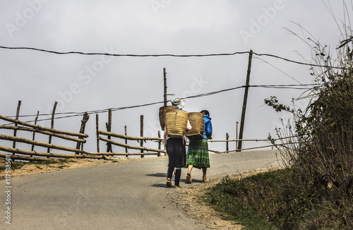 Tribal women on the road photo