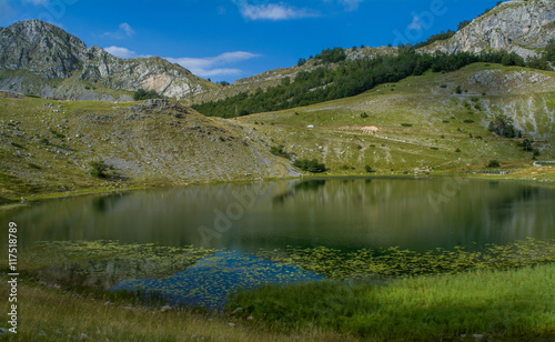 Lake surrounded by beautiful mountains