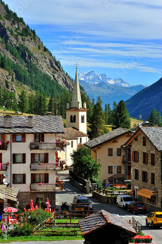 Rhemes Notre Dame with church bell tower above photo