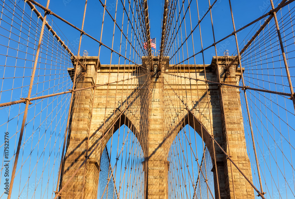 Obraz premium Brooklyn Bridge o zachodzie słońca w Nowym Jorku, USA