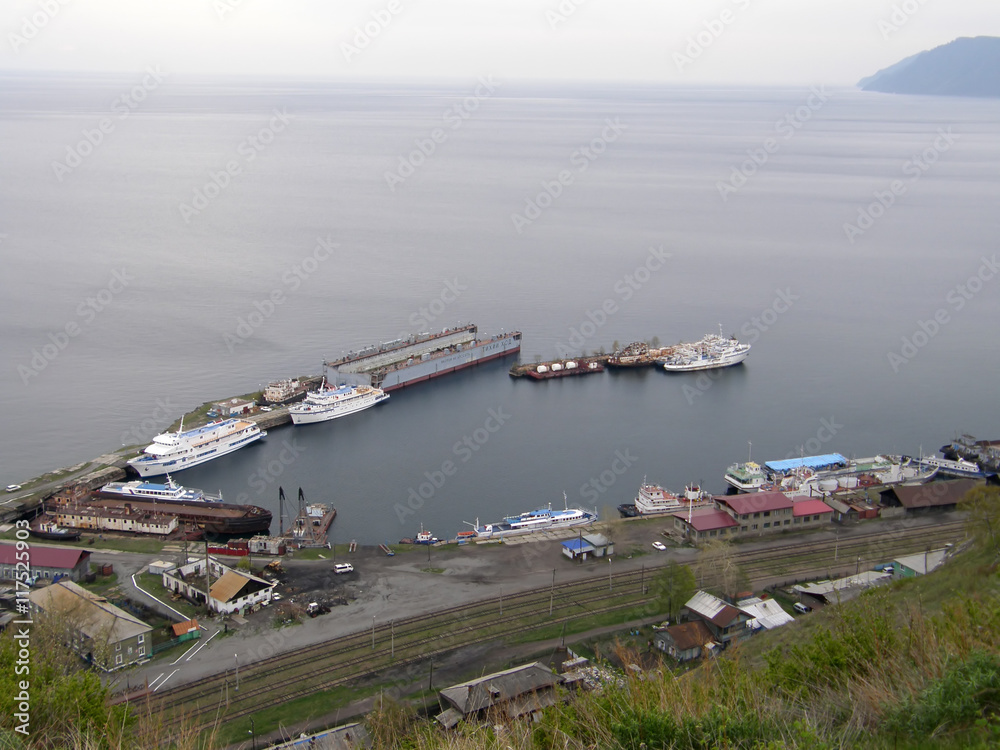 Pier and boats in Port Baikal. Irkutsk region. Siberia.