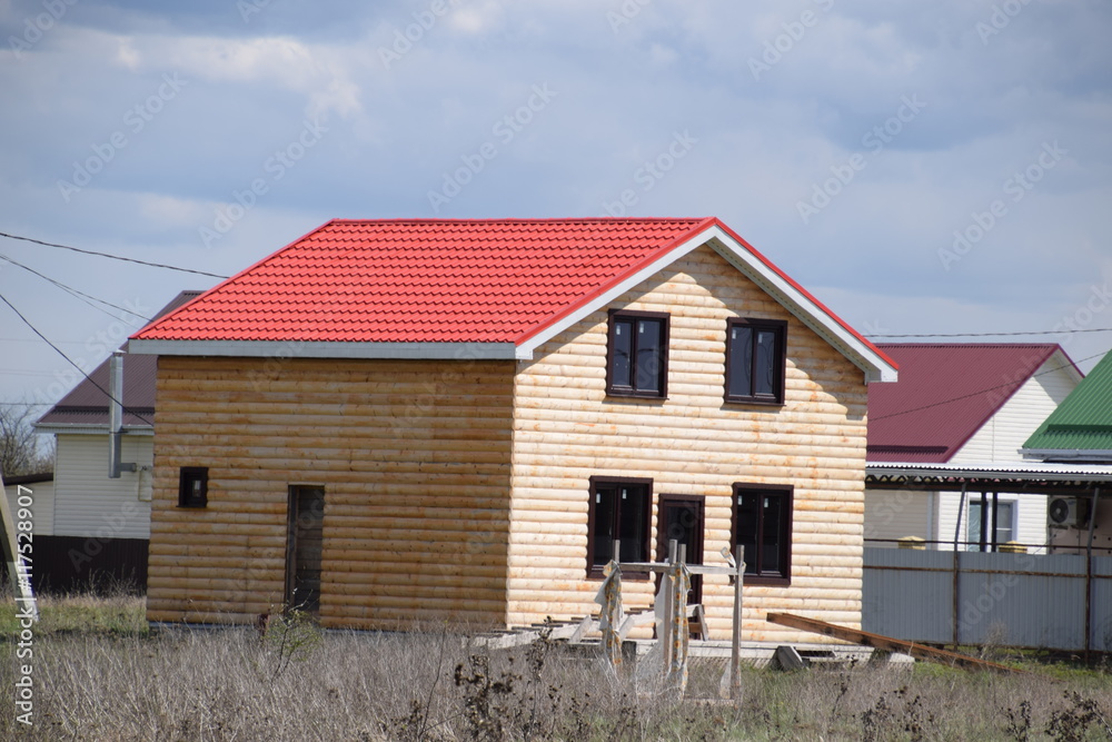 House with a roof made of metal sheets