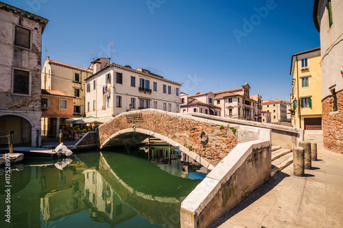 Typical bridge across a canal in Chioggia  Venice  Italy.