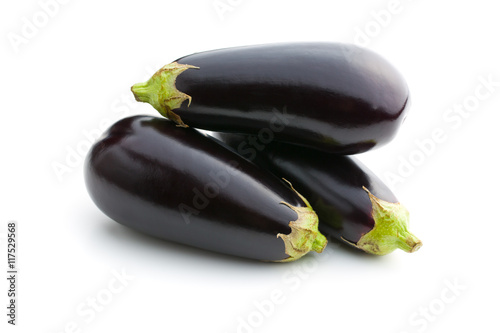 three fresh eggplants
