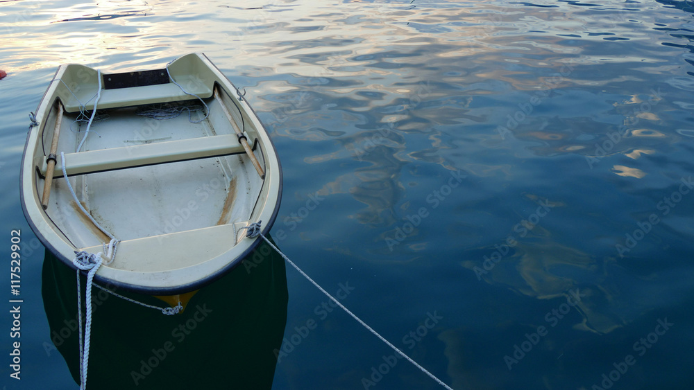 Small white boat at sea