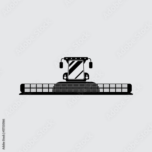 Combine harvester vector silhouette. Simple icon