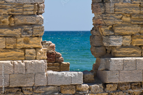 sea view through the ruined building