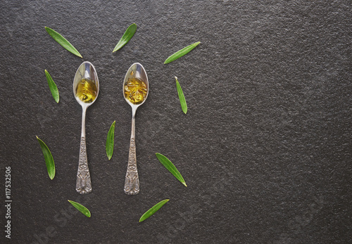 Olive oil in vintage spoons