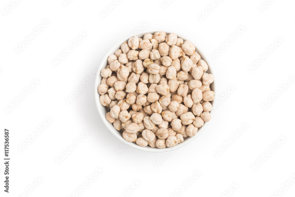 Raw Chickpeas into a bowl in white background. Raw Chickpeas into a bowl in white background.