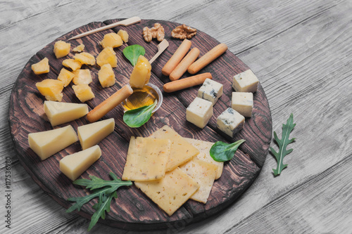 Assorted assortment of sliced cheeses