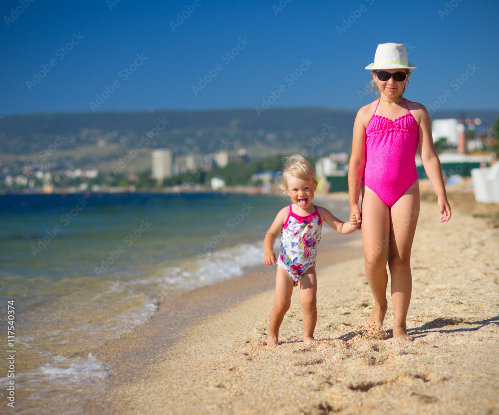 Two girls on sea coast Two girls on sea coast