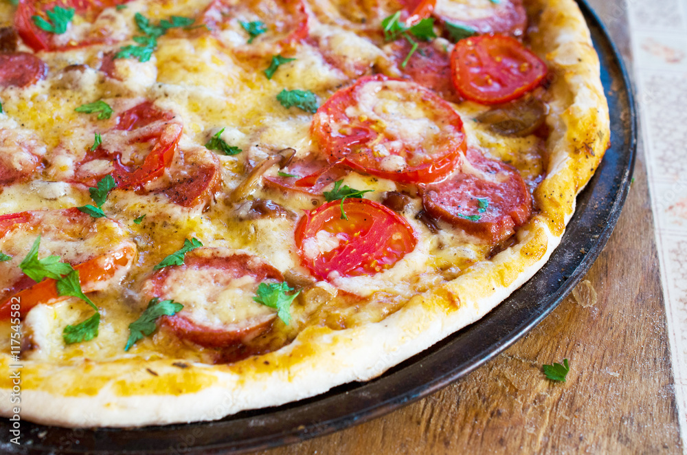 Close up of tasty pizza with chicken, tomato and cheese Close up of tasty pizza with chicken, tomato and cheese
