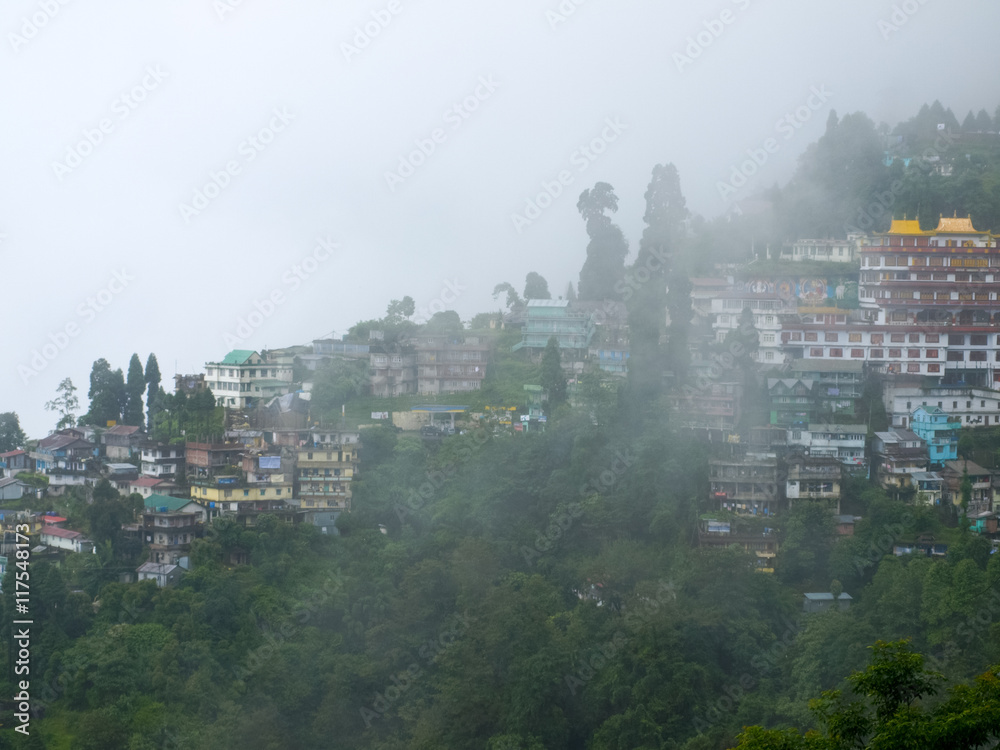 Fototapeta premium Darjeeling town in fog, India