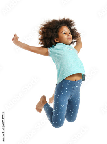 Happy African girl jumping,...