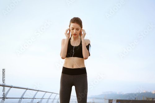 Young woman doing exercises...