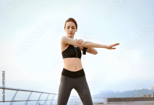 Young woman doing exercises...