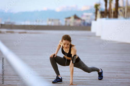 Young woman doing exercises...
