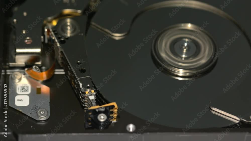 HDD - A Hard Disk Drive is open, real open hard drive HDD - A Hard Disk Drive is open, real open hard drive