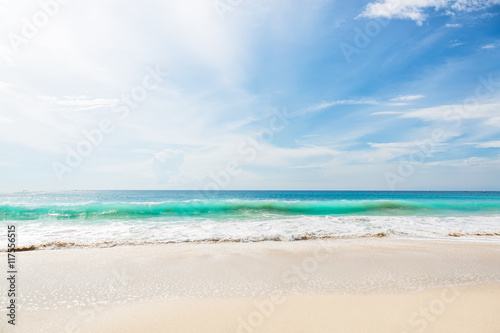 Tropical beach and blue ocean in Bali