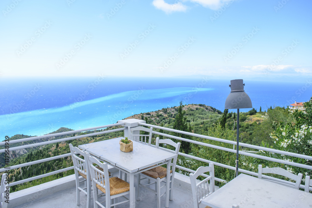 Luxury terrace balcony of exclusive seaside resort with fancy ta Luxury terrace balcony of exclusive seaside resort with fancy ta