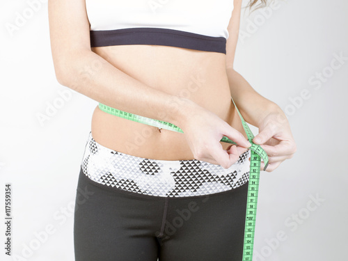 beautiful young women with sportswear in studio