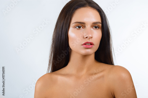 Beauty Girl. Portrait of Beautiful Young Woman looking at Camera.