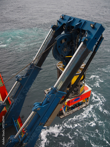 ROV or remote operated vehicle deployed off the side of a ship