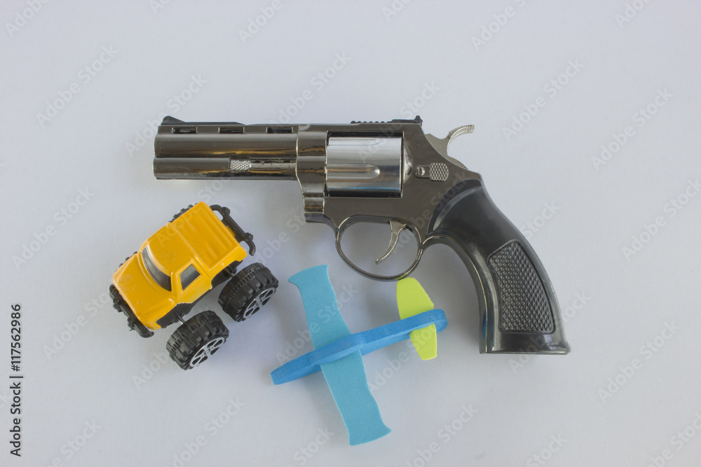 gun. revolver car and a plane.