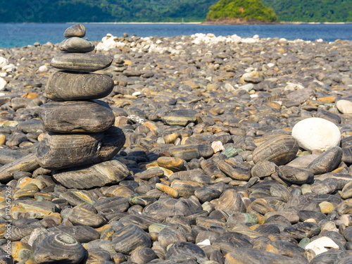 Pyramid of stones row on the beach