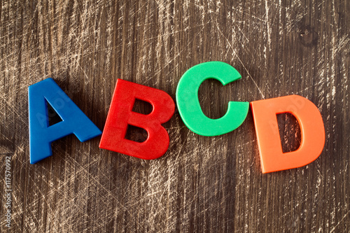 ABCD spelling from plastic letters photo