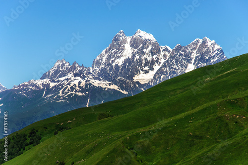 Two peaks of Mount Ushba. Main Caucasian Ridge.