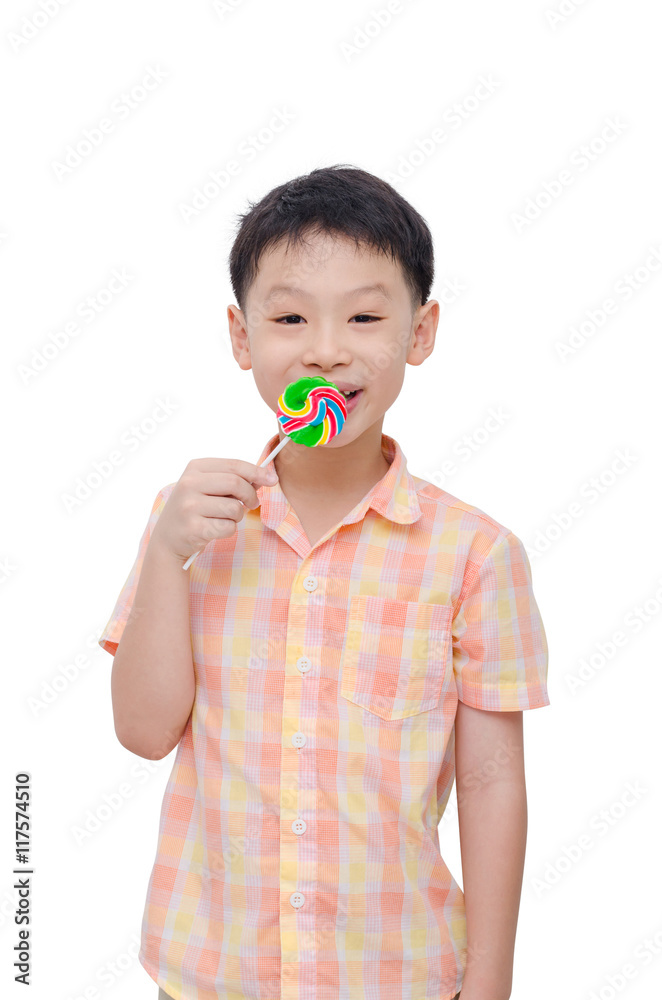Young asian boy with lollipop over white background Young asian boy with lollipop over white background