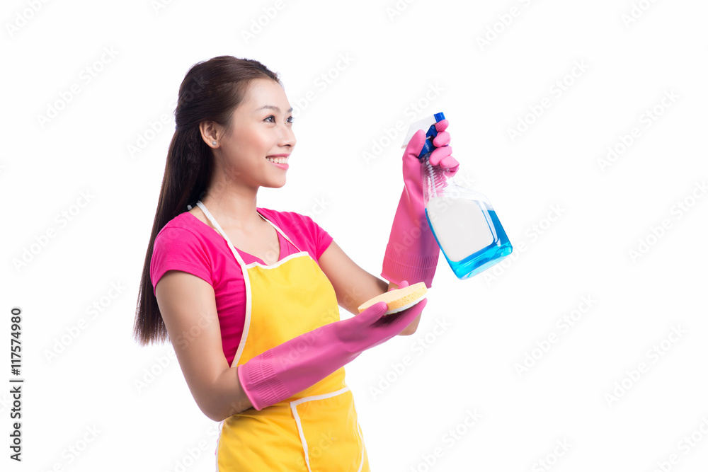 Portrait of a beautiful girl with a detergent for cleaning Portrait of a beautiful girl with a detergent for cleaning
