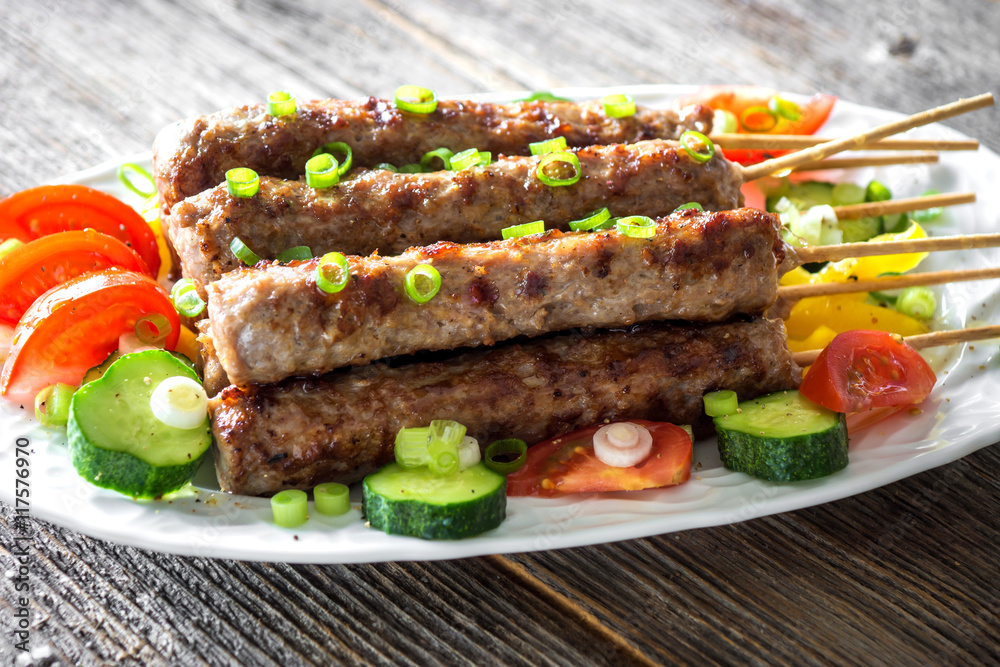 Minced meat kebab with fresh vegetable