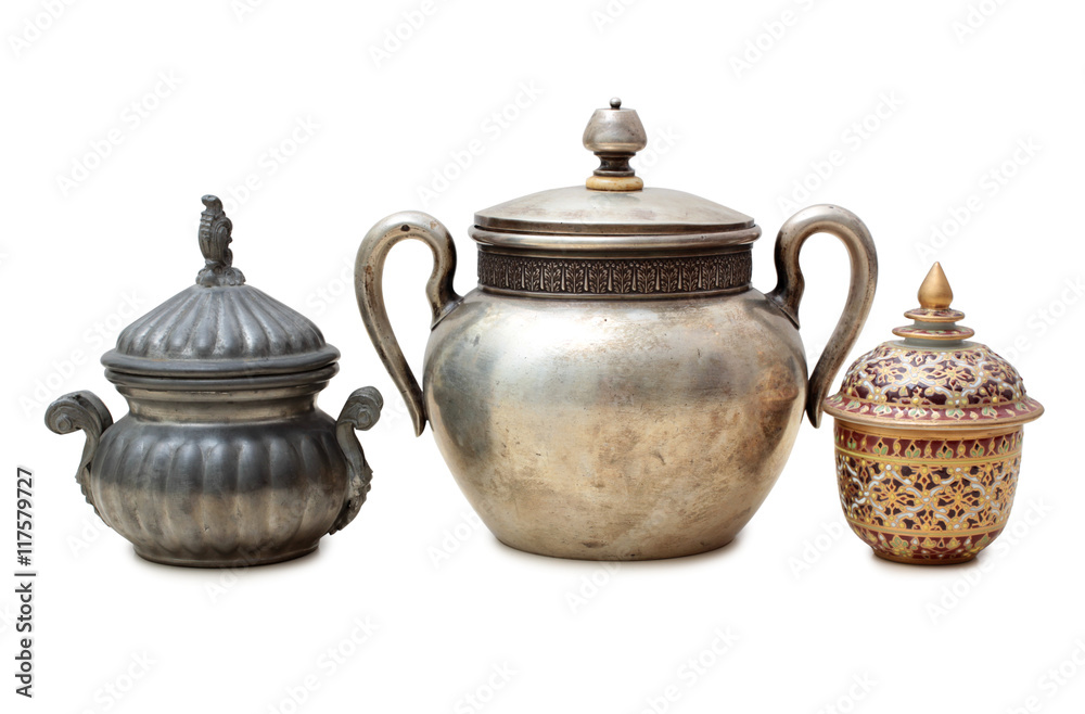 Old metal pot on a white background Old metal pot on a white background