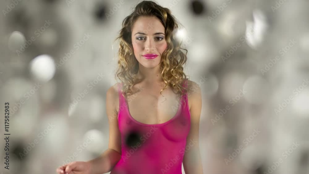women dancing in pink sparkly background women dancing in pink sparkly background