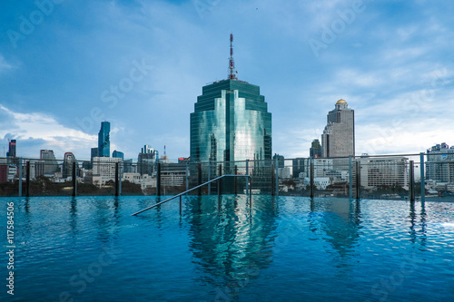 Photography Swimming pool with cityscape.