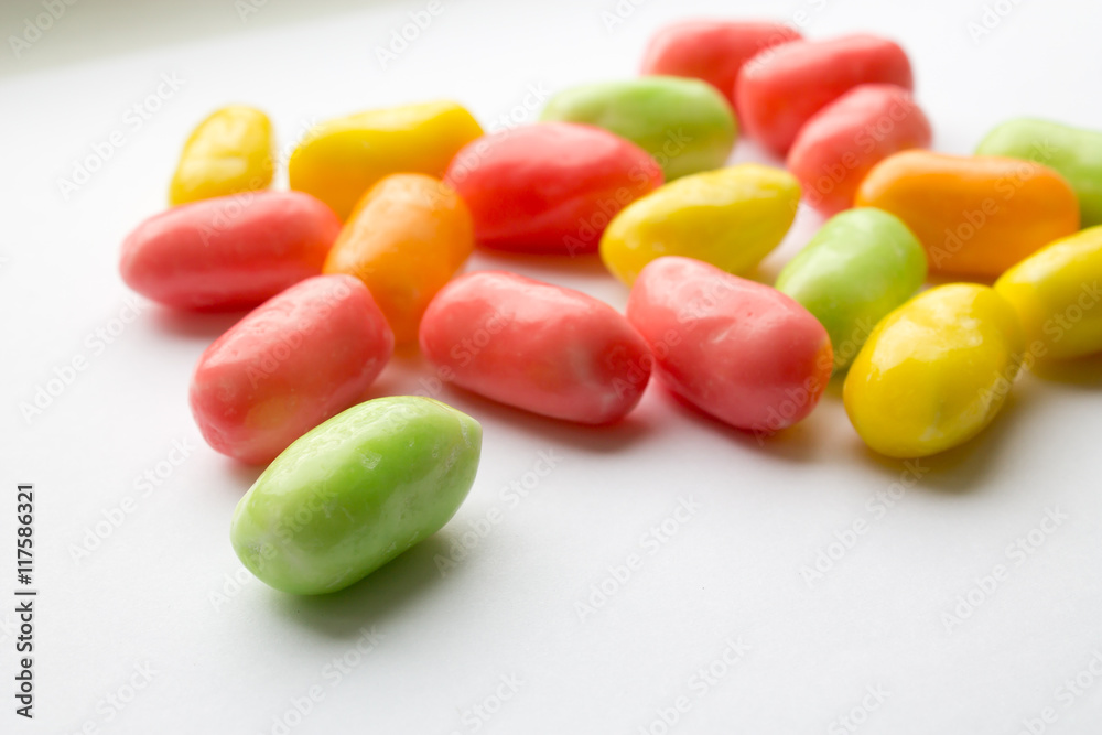 colored candy on white background closeup colored candy on white background closeup