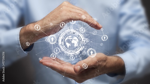 Businessman holding in hand a global connection,communications concept